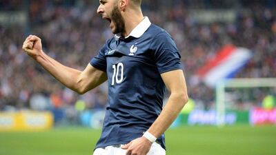 Karim Benzema and France beat Netherlands 2-0. They'll play in Group E at the 2014 World Cup with Switzerland, Ecuador and Honduras. Damien Meyer / AFP
