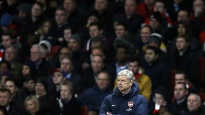 Arsenal's French manager Arsene Wenger is not amused by comments from former Manchester United midfielder Paul Scholes stating the London club is 'a million miles' from winning a Premier League title. Adrian Dennis / AFP