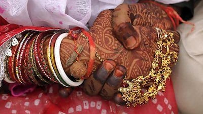 Marriage is big business in India, where Matrimony.com has helped to broker more than 2 million weddings. Ajit Solanki / AP Photo