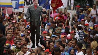 Venezuelan pro-government activists rally to express their support to the Constituent Assembly in Caracas, on August 7, 2017. / AFP PHOTO / Federico Parra