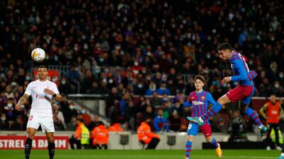 Barcelona forward Ferran Torres attempts a shot on goal against Sevilla. AP
