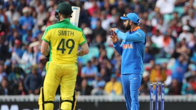 Virat Kohli, right, and Steve Smith during India's Cricket World Cup match against Australia. AP