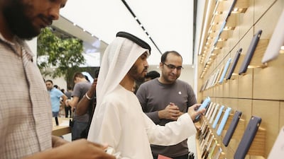 The first customers in the new store at Mall of the Emirates in Dubai. Sarah Dea / The National