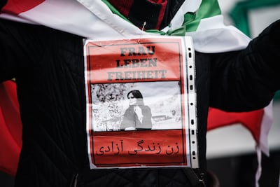 A German poster in support of the Iranian women's rights movement. German prosecutors have declined to investigate the January crackdown in Iran. EPA