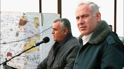 Israeli Prime Minister Benjamin Netanyahu and his then-defence minister, Yitzhak Mordechai, at the Alfei Menashe settlement in 1997. AFP