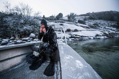 Lotta Klemming, a professional oyster diver, prepares for a dive on Sweden’s west coast. AFP