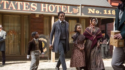 From left, Cameron Zeigler, Chiwetel Ejiofor, Quvenzhané Wallis and Kelsey Scott in a scene from “12 Years A Slave.” Fox Searchlight, Jaap Buitendijk / AP photo