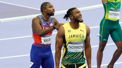 Noah Lyles of USA and Kishane Thompson of Jamaica wait for the result. EPA