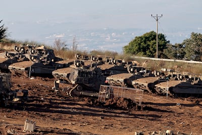 Israeli tanks gather on the Israel-Lebanon border after the announcement of a US-Iran mediated preliminary framework to end regional military hostilities. EPA