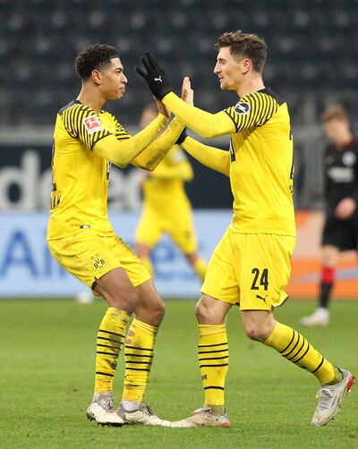 Dortmund midfielder Jude Bellingham (L) celebrates with Thomas Meunier after levelling the scores. AFP