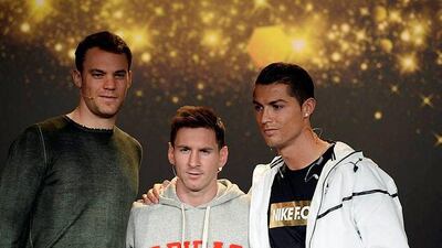 From left, Manuel Neuer, Lionel Messi and Cristiano Ronaldo during a press conference before the Ballon d'Or awards ceremony in Zurich. Walter Bieri / EPA