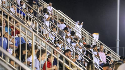 Real Madrid training session at the NYU Abu Dhabi football stadium. Football fans at the practice session.