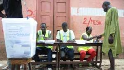 Josef Felitiano, a mechanic, votes in Guinea Bissau's presidential election yesterday, four months after its former leader was killed.