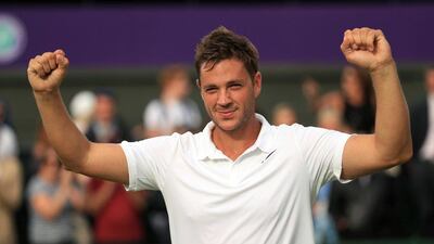 Britain's Marcus Willis, the world number 772, celebrates his victory over 54th-ranked Lithuania's Ricardas Berankis 6-3 6-3 6-4 on day one of the Wimbledon Tennis Championships in London, Monday, June 27, 2016. (Adam Davy/PA via AP)