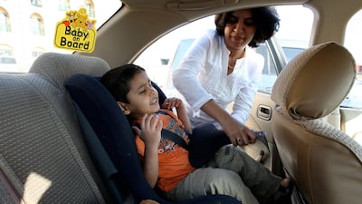 By law, all children under 4 must travel in a car seat. Pawan Singh / The National
