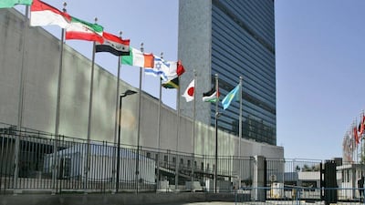 The flags of member nations fly outside of the United Nations headquarters in this 2007 file photo. Mary Altaffer / AP