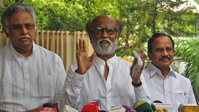 Indian actor Rajinikanth, centre, revealed on December 3 he would enter politics, before announcing a U-turn. AFP