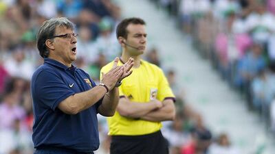 Barcelona manager Gerardo Martino gestures during his side's draw with Elche on Sunday. Jaime Reina / AFP / May 11, 2014