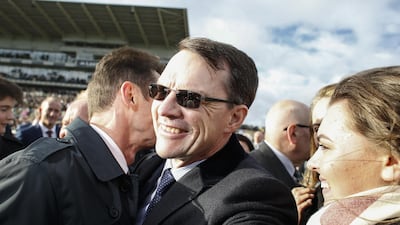 Aidan O'Brien, centre, celebrates as Saxon Warrior wins at Doncaster to give him a record 26 Group 1 winners in a year. Alan Crowhurst / Getty Images