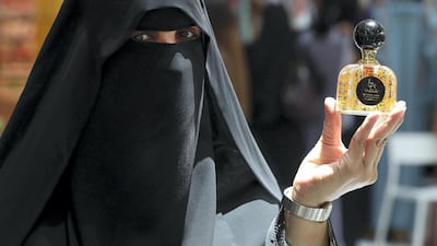 Um Saif sells her perfumes at an exhibition organised for Emirati and Kuwaiti families in Dubai. Chris Whiteoak / The National