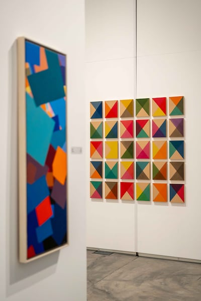 Paintings by Palestinian artist Samia Halaby, left, and Bangladeshi artist Rana Begum. Photo: Dubai Culture