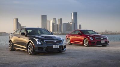 The Cadillac ATS-V, with the saloon in black and the coupé in red. The ATS-V is one of two fresh models from the American carmaker aimed at rivalling the likes of BMW, Jaguar and AMG. Courtesy Cadillac