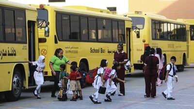 Using phones and playing with friends is putting children’s lives at risk outside schools. Sarah Dea / The National