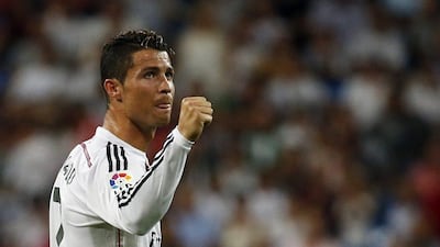 Real Madrid's Cristiano Ronaldo celebrates after scoring a goal against Cordoba during their La Liga match on Monday night. Sergio Perez / Reuters / August 25, 2014