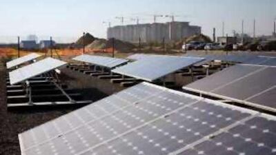 Solar panels undergo testing at Masdar. Abu Dhabi plans to build a solar thermal plant capable of generating 100 megawatts.