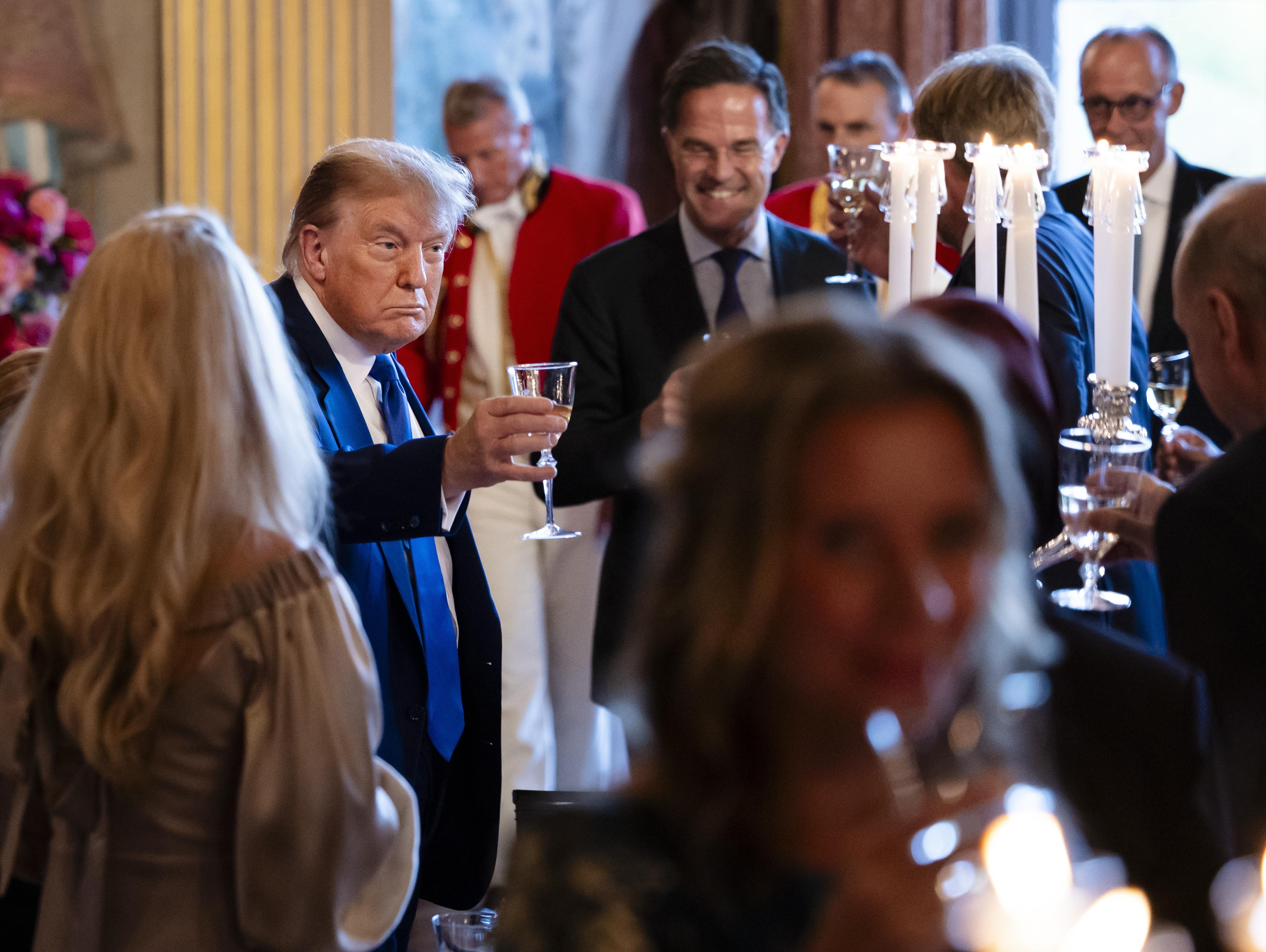 US President Donald Trump, left, at a dinner with heads of state and government at Paleis Huis Ten Bosch at the invitation of Dutch King Willem-Alexander in The Hague. EPA