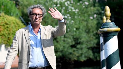 Italian filmmaker Paolo Sorrentino arrives at Lido Beach ahead of the 78th Venice International Film Festival on August 31, 2021 in Venice, Italy. EPA