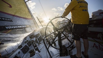 Luke Parkinson of Abu Dhabi Ocean Racing steers the boat through the Atlantic Ocean during the sixth leg of the Volvo Ocean Race. Matt Knighton / Abu Dhabi Ocean Racing / Volvo Ocean Race