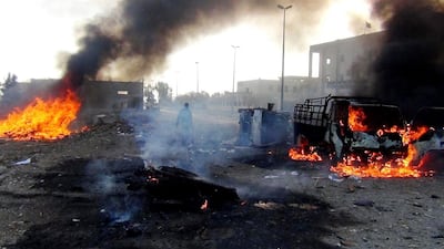 An airstrike by Syrian government forces in the ISIL-controlled city of Raqa in Syria on November 25, 2014 killed at least 95 people. AFP Photo