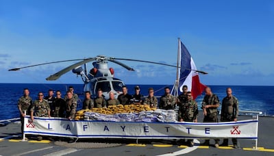 The French Navy La Fayette, part of the 32-nation Combined Maritime Forces, with a massive drugs haul seized on the seas. Courtesy Combined Maritime Forces