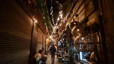 People walk at the Khan el-Khalili market during the holy month of Ramadanin in Cairo, Egypt. Mohamed El-Shahed / AFP