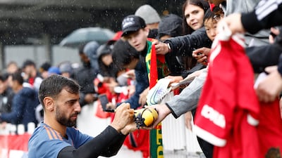 Bruno Fernandes of Manchester United signs autographs. Getty Images