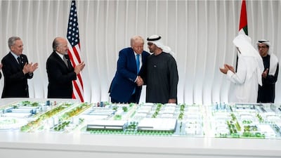 President Sheikh Mohamed and US President Donald Trump look at the design for Abu Dhabi's UAE-US AI Campus, which will become one of the largest AI infrastructure projects outside the US. Photo: Talal Al Kaissi