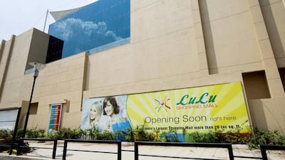 A signboard outside the Lulu shopping mall funded by Abu Dhabi based EMKE, in Kochi, Kerala, India. Simond de Trey-White for The National
