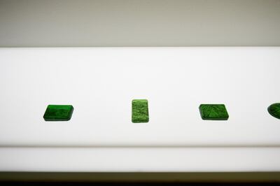 Saba Qizilbash's charcoal drawings encased in green resin. Warehouse421