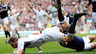 England's Tom Croft scores his try against Scotland during their Six Nations at Twickenham Stadium. Eddie Keogh / Reuters