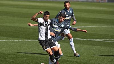 Parma's Gaston Brugman shields the ball. EPA