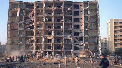 Investigators inspect the Khobar Towers military complex after an attack in Khobar, Saudi Arabia in June 1996. Reuters