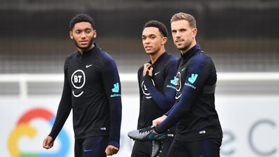 Left to right: Joe Gomez, Trent Alexander-Arnold and Jordan Henderson. Getty