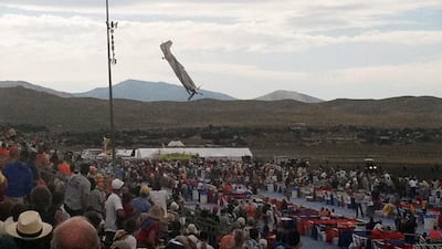 September 16, 2011 photo: A P-51 Mustang airplane approaches the ground right before crashing during an air show in Reno, Nev. The vintage World War II-era fighter plane piloted by Jimmy Leeward plunged into the grandstands during the popular annual air s???