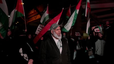 Campaign group Palestine Solidarity Campaign protesting on a street near Villa Park. PA