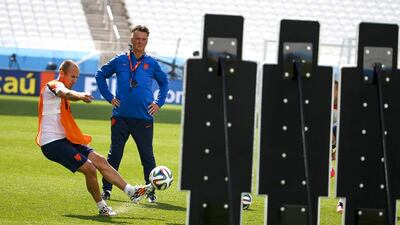Arjen Robben, left, and Netherlands coach Louis van Gaal have been outspoken in their distaste for playing the third-place match on Saturday. Diego Azubel / EPA