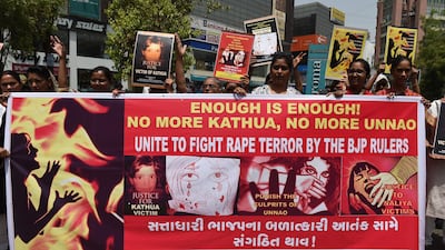 Indian activists and students protest over the rape of a child near Jammu and a rape case in Uttar Pradesh state, in Ahmedabad, India, on April 13, 2018. Sam Panthaky / AFP
