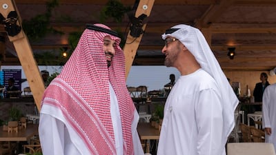 Sheikh Mohamed bin Zayed, the Crown Prince of Abu Dhabi, and Mohammad bin Salman, his Saudi counterpart, meet last year at the 2018 Formula E Saudi Ad Diriyah E Prix. Mohamed Al Hammadi / Ministry of Presidential Affairs