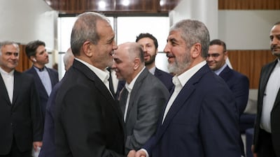 Iran's President Masoud Pezeshkian meets senior Hamas figure Khaled Meshaal in Doha on October 2. Reuters