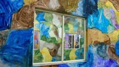 Visitors admire a creation by the Chinese artist Zhang Enli at the Kochi-Muziris Biennale. Sivaram V / Reuters